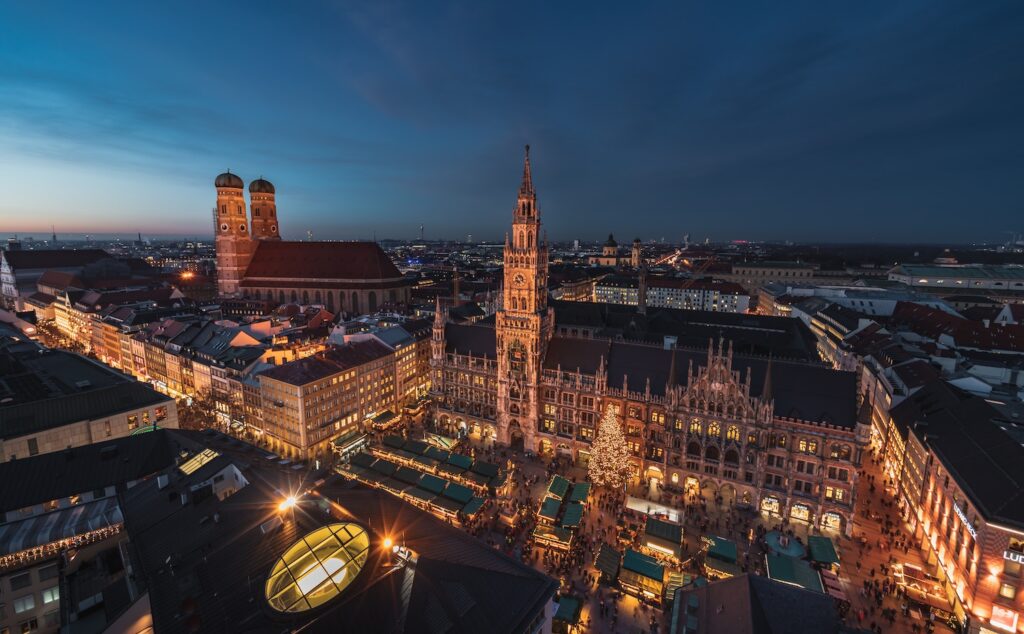 The City Guide to Munich: aerial shot of the city center at sundown