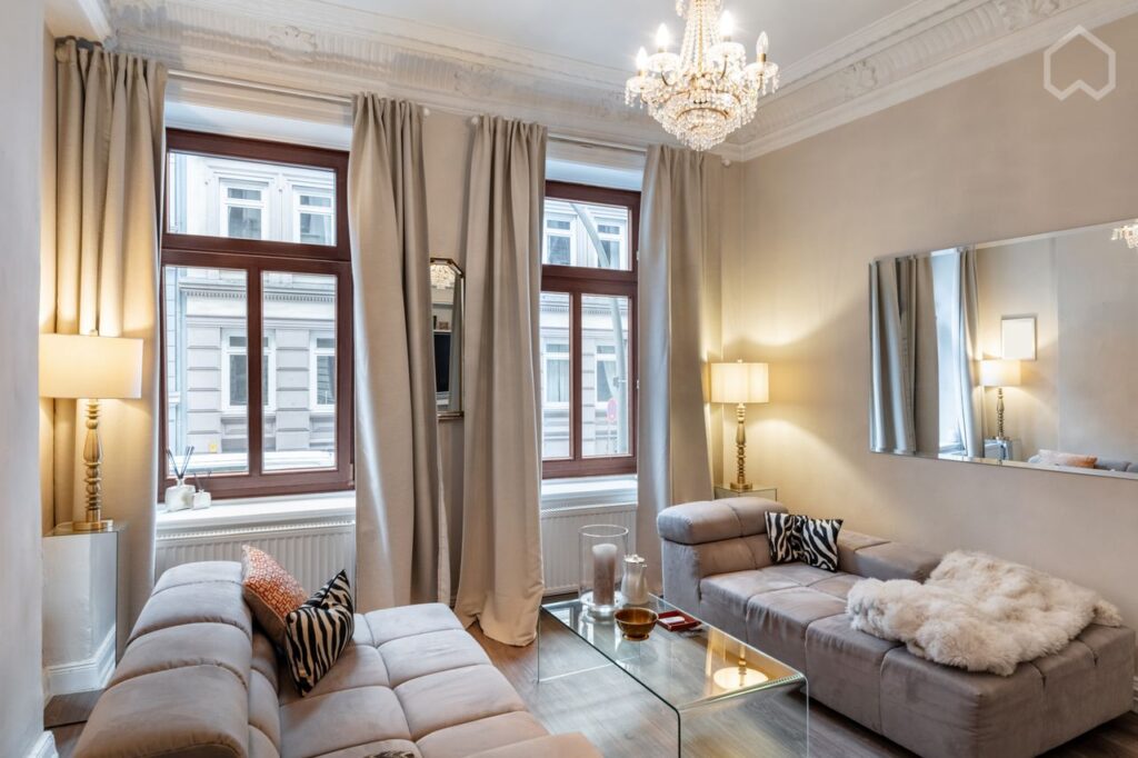 The City Guide to Hamburg: living room with a couch and a coffee table in a furnished apartment from Wunderflats