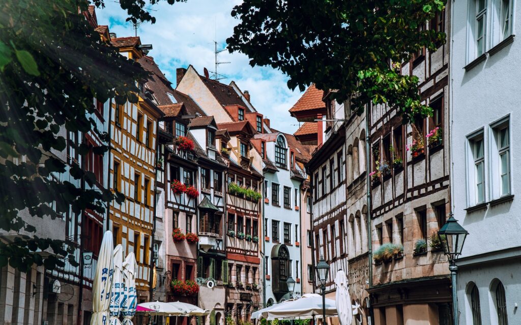 The City Guide to Nuremberg: a view of a street with Medieval buildings in the inner city