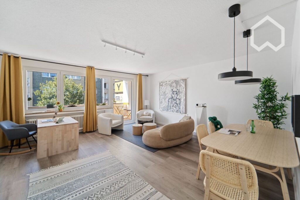 The City Guide to Düsseldorf: the living room of a furnished apartment available on Wunderflats